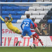 Louis Jones can't keep out Peterborough's opening goal. Picture: Howard Roe/AHPIX LTD