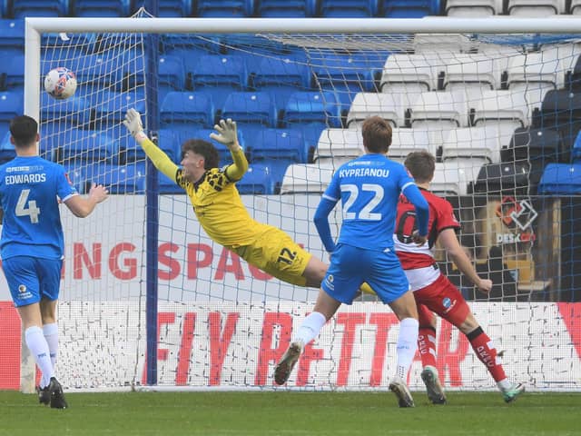 Louis Jones can't keep out Peterborough's opening goal. Picture: Howard Roe/AHPIX LTD
