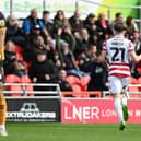 Doncaster's Kyle Hurst celebrates his goal.