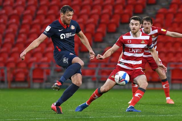 Ben Whiteman keeps a close eye on Sunderland's Charlie Wyke. Picture: Andrew Roe/AHPIX