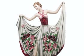 A dancing lady figurine by Goldscheider