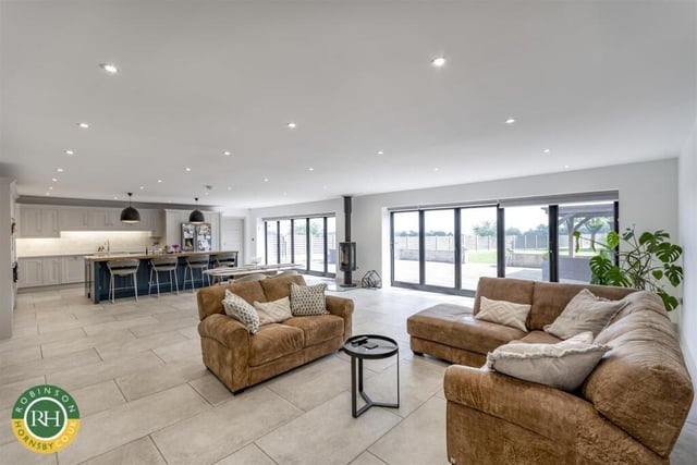 The ground floor open plan arrangement with bi-fold doors to outside.