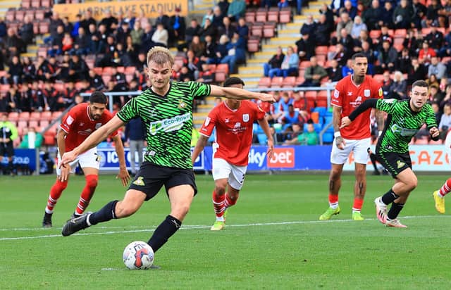George Miller steps up to take his penalty.