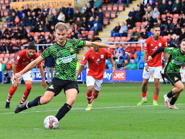 George Miller steps up to take his penalty.