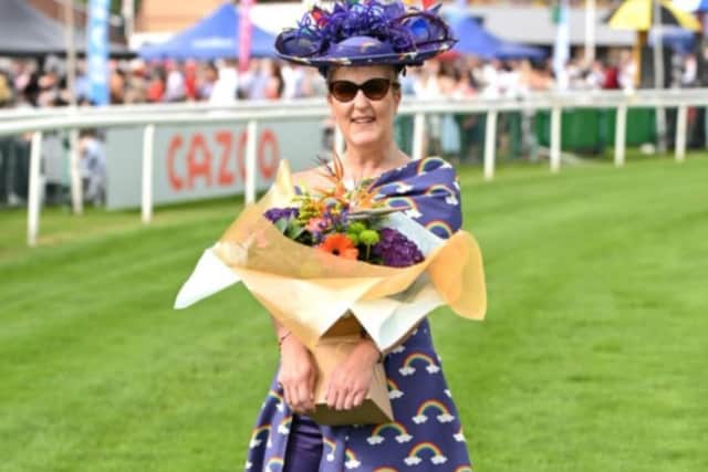 NHS nurse Gail Eden scooped the best-dressed award for her NHS rainbow dress at Doncaster Racecourse.