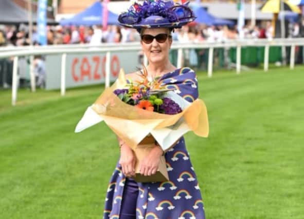 NHS nurse Gail Eden scooped the best-dressed award for her NHS rainbow dress at Doncaster Racecourse.