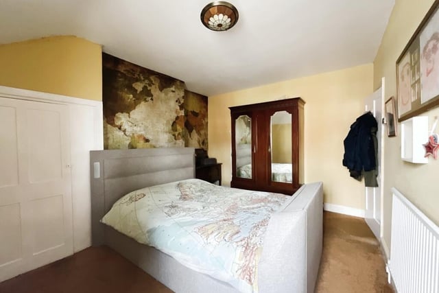 One of three double bedrooms within the property.