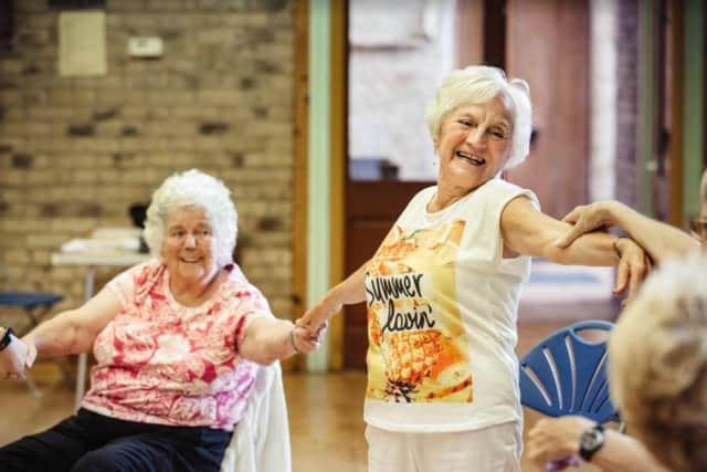 The dance classes help people with Parkinson's disease.