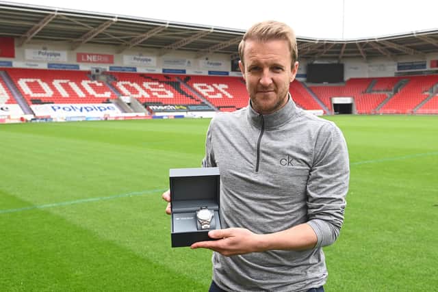 James Coppinger with the watch presented to him by Doncaster Rovers following his retirement from playing. Picture: Howard Roe/AHPIX