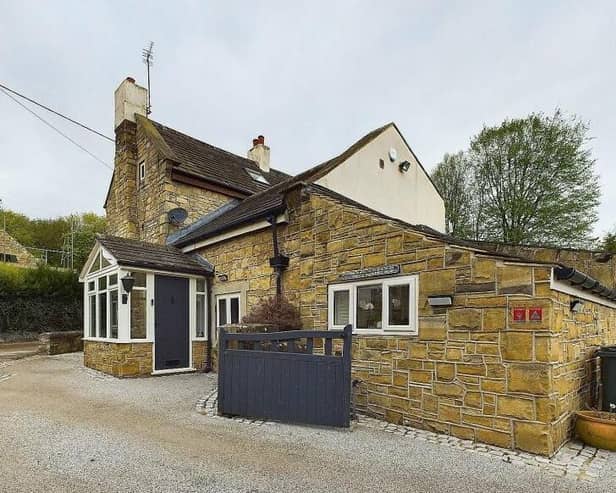 The attractive exterior of the four-bedroom cottage for sale in High Melton
