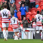 Doncaster's players celebrate Kyle Hurst's goal against Crawley Town last time out.