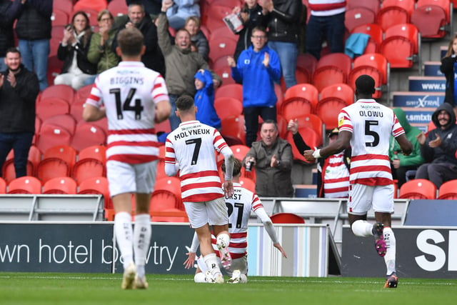 Doncaster's players celebrate Kyle Hurst's goal against Crawley Town last time out.