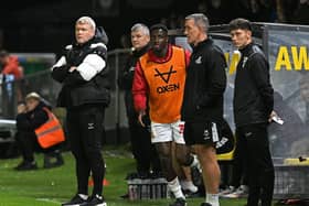 Rovers' manager Grant McCann (left) says the club recruited this summer with their preferred formation in mind.