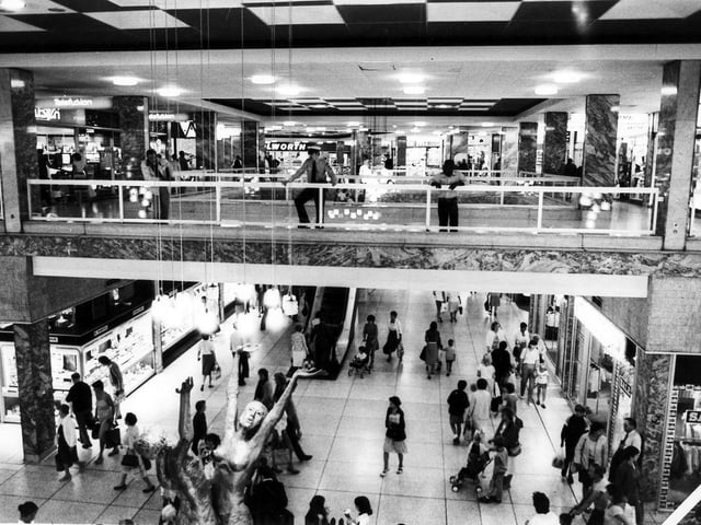 A view of the Arndale Centre with the 'Lovers Statue' in the foreground