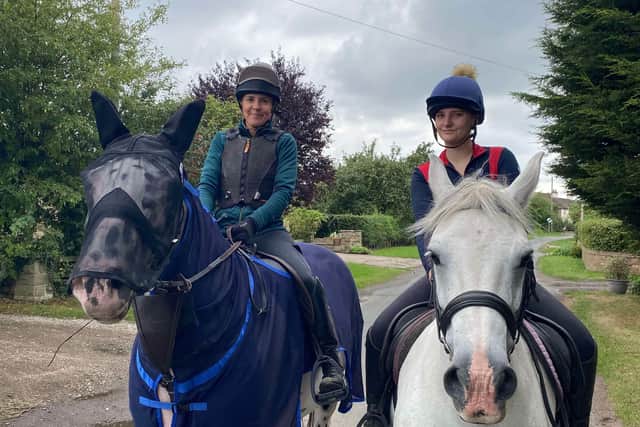 Anita Marsh out riding with her daughter.