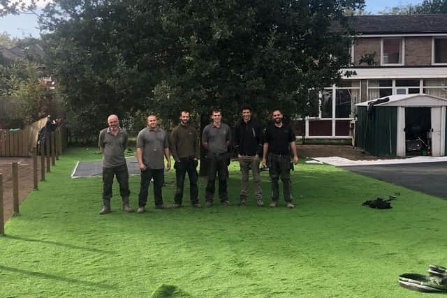 The Ava Turf team who put down the artificial grass at the nursery.