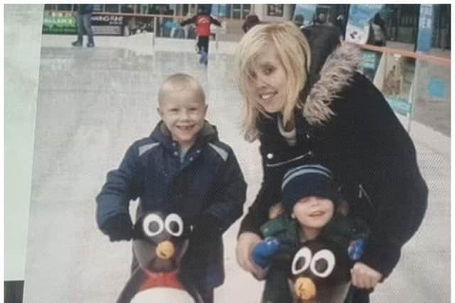 Rebecca, with Jayden and his brother Matthew.
