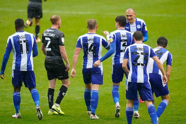 Wigan celebrate after Joe Garner puts them ahead against Rovers. Picture: Steve Flynn/AHPIX