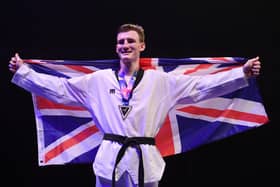 Bradly Sinden of Great Britain celebrates with his Gold medal after victory against Javier Perez Polo of Spain in the Final of the Mens -68kg during Day 3 of the World Taekwondo Championships at Manchester Arena on May 17, 2019 in Manchester (Picture: Laurence Griffiths/Getty Images)