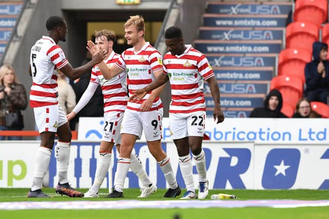 Doncaster's George Miller celebrates scoring against Crawley Town last time out.
