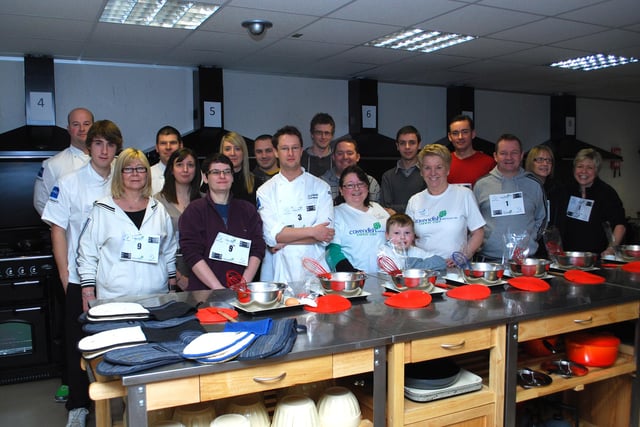Competitors make pancakes for their race at Coghlans Cookery School in Dronfield and raise money for Cavendish Cancer Care in 2010.
