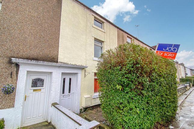 This four-bedroom, terrace home is on the market for £100,000 with JD Gallagher.