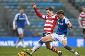 Doncaster Rovers are a point off the top three after victory at Gillingham.