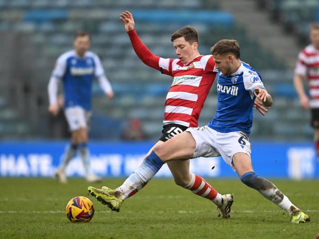 Doncaster Rovers are a point off the top three after victory at Gillingham.