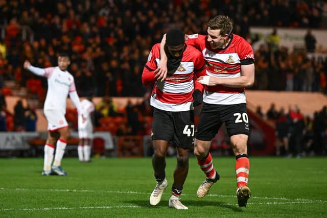 Doncaster's Hakeeb Adelakun scores and celebrates the second goal of the game.
Picture: Liam Ford/AHPIX LTD, Football, EFL League Two, Doncaster Rovers v Walsall, Eco-Power Stadium, Doncaster, UK, 09/04/24, K.O 7:45pm
Howard Roe>>>>>>07973739229,