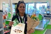 Former athlete Tara Dobson ran with defibrillator  to help save motorist.