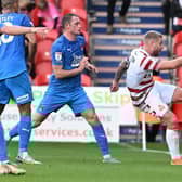 Adam Clayton goes long against Leyton Orient.