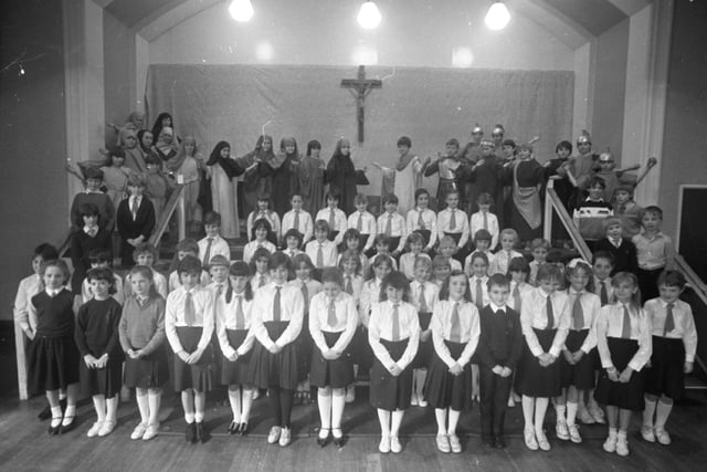 A group of Lancashire school children will make their screen debut when the BBC films their special Easter service. The pupils of St Mary and St Benedict's school in Bamber Bridge are to present a Passion service on Good Friday and, as they do, the cameras will be rolling. Pictured above, some of the cast rehearse