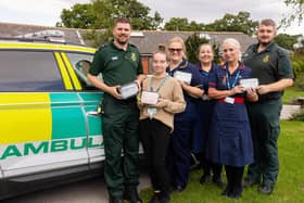 RDaSH staff are pictured with members of the Yorkshire Ambulance Service with the new kits.