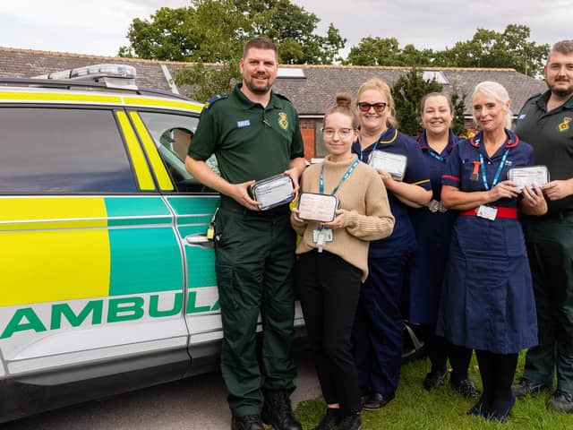 RDaSH staff are pictured with members of the Yorkshire Ambulance Service with the new kits.