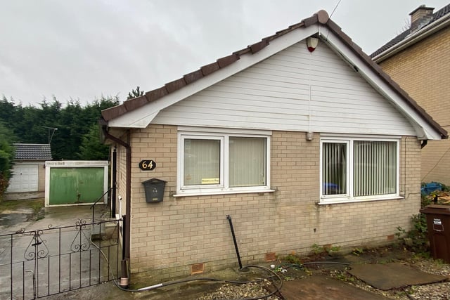 Two-bedroom, detached bungalow in an unusually large plot of 0.14 acres, with a long driveway and two garages. Potential for refurbishment, extension, or new build. Guide price: £90,000-£100,000.
