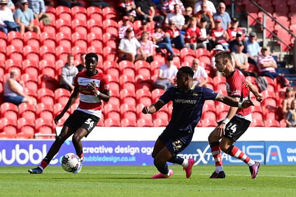 Zain Westbrooke has a shot at goal for Doncaster Rovers against Swindon Town.