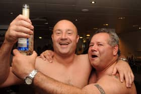 Dons chief executive Carl Hall and head coach Tony Miller celebrate promotion to the Championship. Picture: Andrew Roe