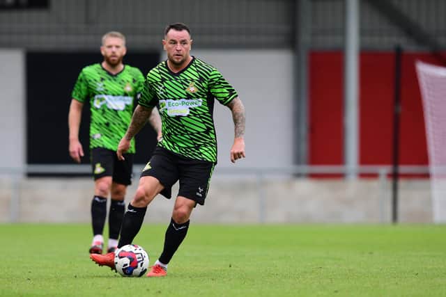 Lee Tomlin faces a race against time to be fit for Doncaster's first game of the season.
