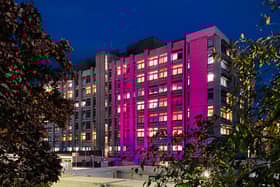 The buildings were illuminated pink