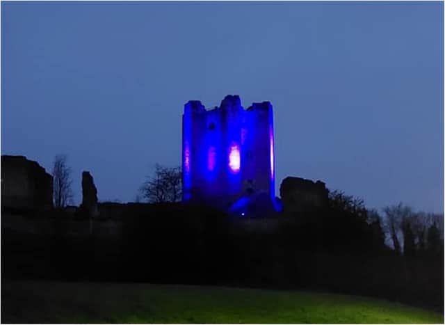Conisbrough Castle was lit up in blue to honour the town's poorly youngsters.