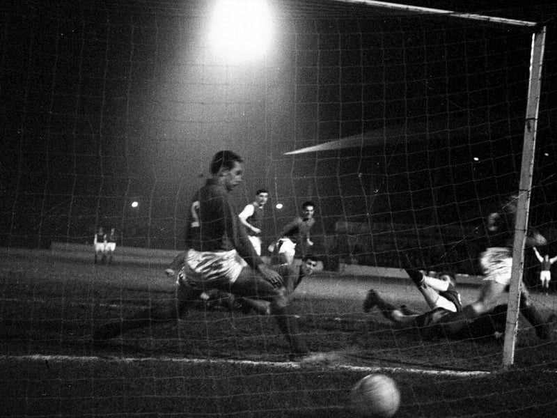 Eric Stevenson scores Hibs' second in a 2-1 win against Utrecht in December 1962
