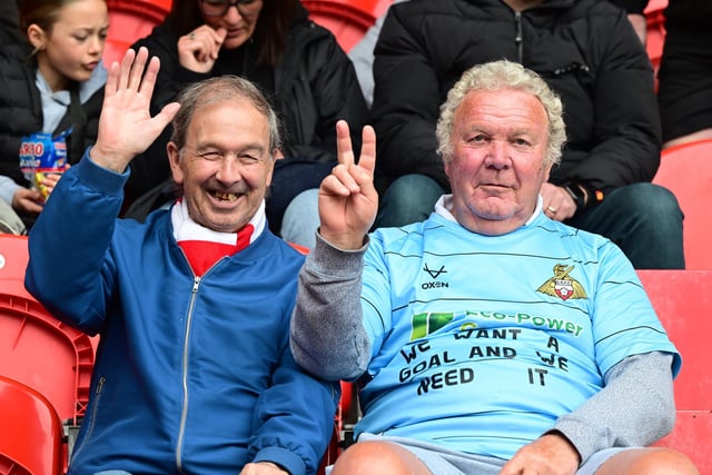 Doncaster Rovers confirmed promotion to League One with a 2-1 victory over Bradford City.