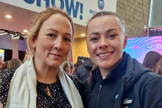 Laura with Mikki Austin who is player-manager-coach of netball superleague team Surrey Storm.