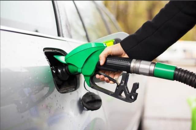 Tthe cost of filling up a typical family car has now topped £100. Photo by Adobe Stock.
