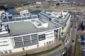 Drone shots show numerous police cars outside Doncaster College in Chappell Drive.