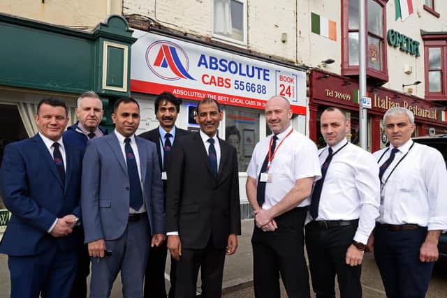 Jaan Saqlain (centre), Managing Director, pictured with l-r Douglas Wallace, Brand Manager, Mark Crane, Head of Training, Tasharat Hussain, VIP Driver, Munir Hussain, Karl Weston, Nicolae Ungureanu and Riza Tas, all Chaffeur Drivers.