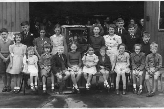 Children on Welbeck Road, Doncaster, at their VE Day street  party  in 1945