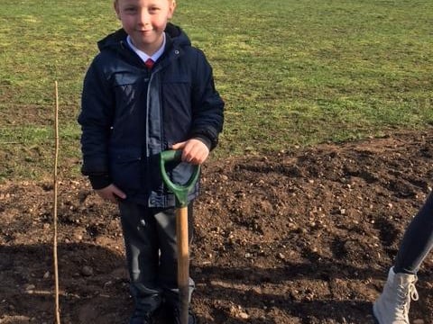 Children embraced the challenge to help plant 600 trees