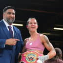 Terri Harper celebrates her world title defence in her hometown, along with promoter Izzy Asif.