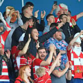 Doncaster Rovers fans are pictured at Oxford United on the final day of the season.